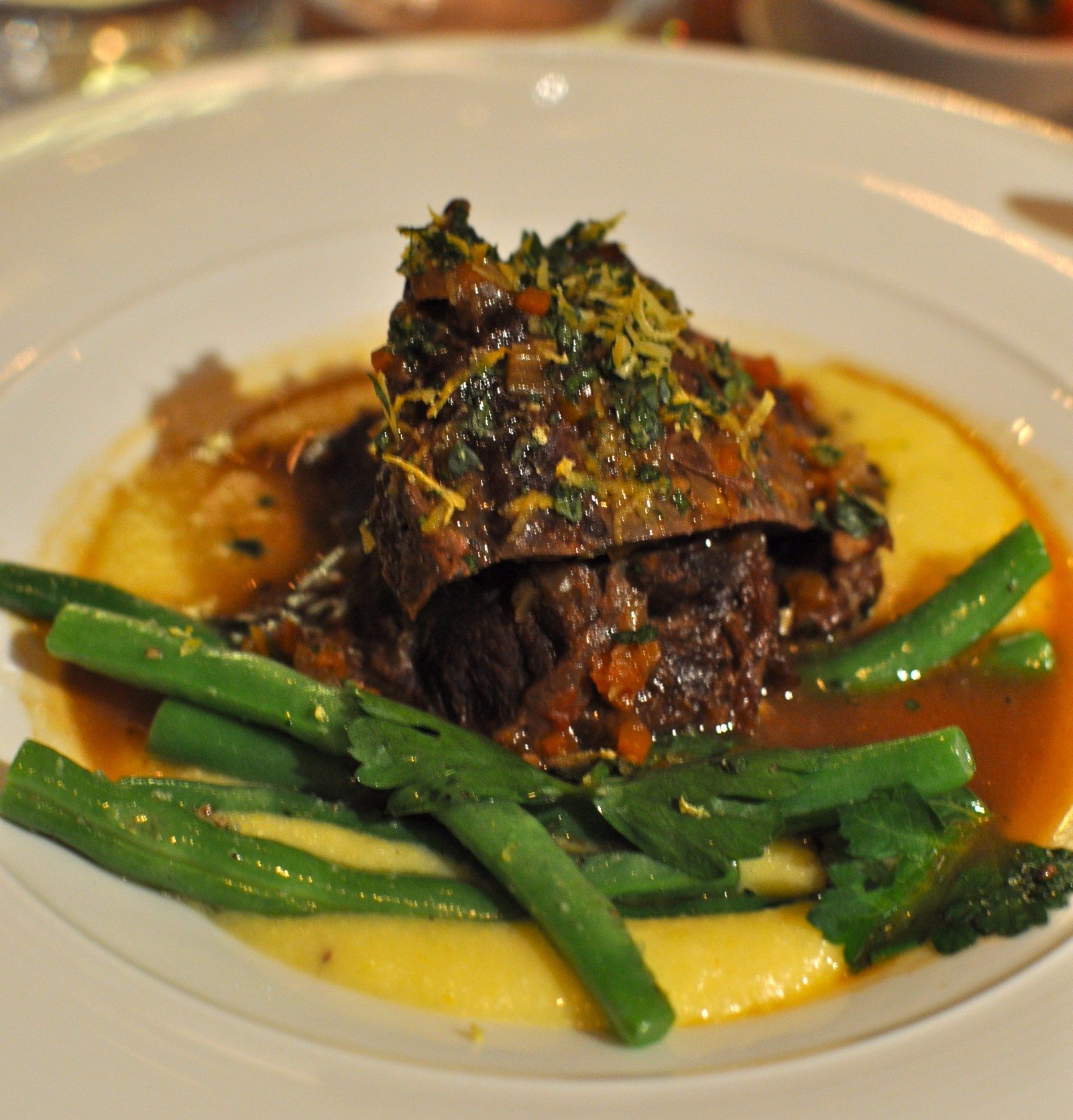 Braised certified organic beef cheeks with creamy polenta, green