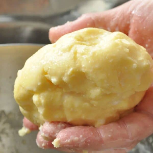 Homemade vanilla butter in hands