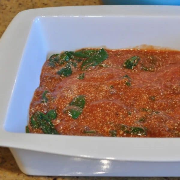 Spreading the mixture in the bottom of the baking dish