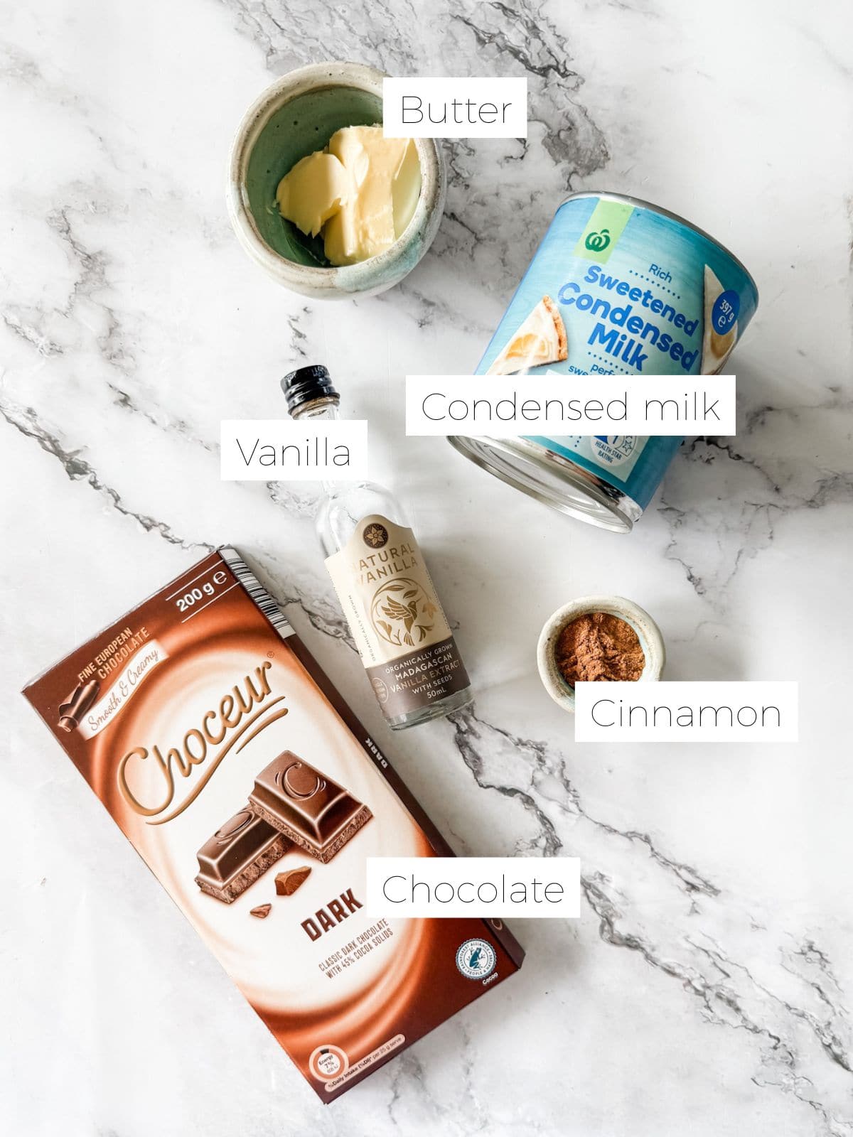 Ingredients in chocolate cinnamon fudge - dark chocolate, condensed milk, vanilla, cinnamon & butter. 
