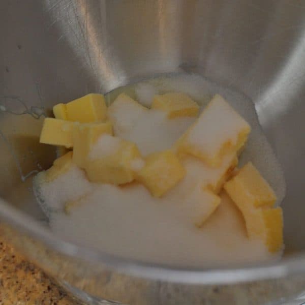 Butter, sugar, condensed milk and vanilla in a bowl for Sante biscuits