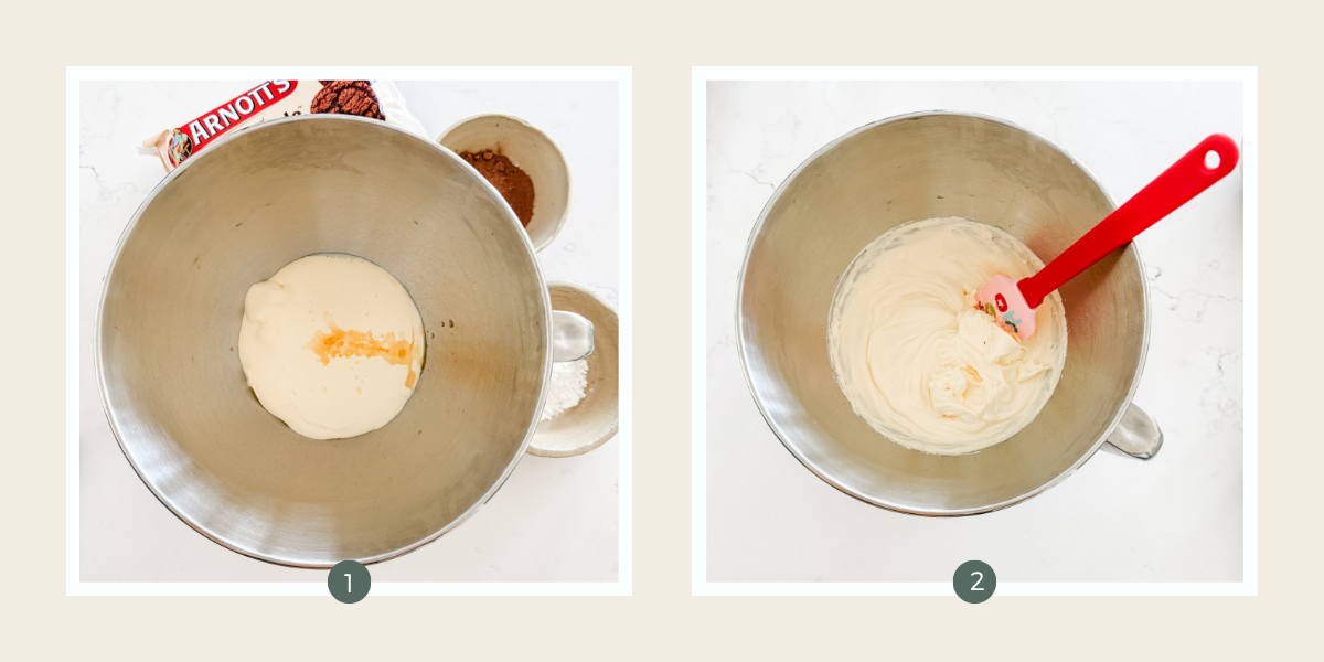Cream and vanilla in the bowl of an electric mixer on a white marble benchtop.