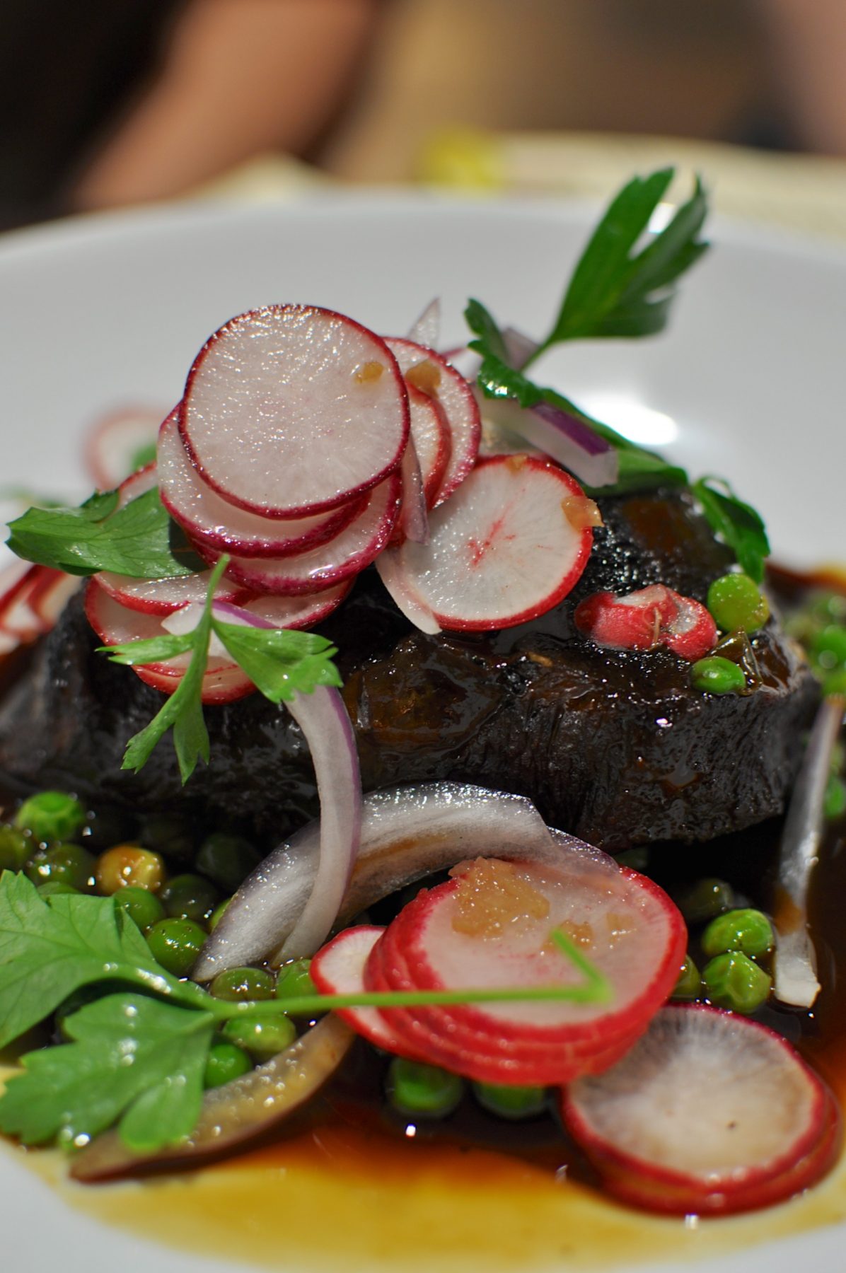 Mejillas de carne beef cheeks braised in pedro ximénez, green pea and radish salad Claire K
