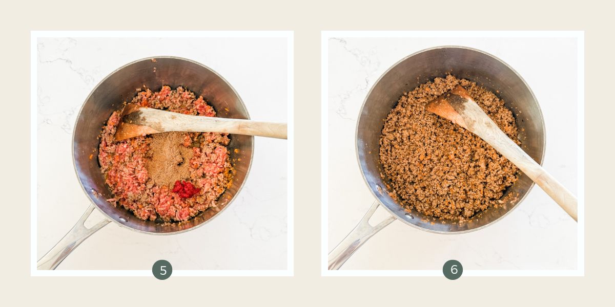 Spices and tomato paste on top of beef mince in a stainless steel saucepan.