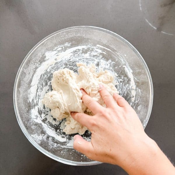 Folding the dough for ciabatta rolls
