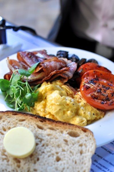 sassa big breakfast... bacon, beef & basil sausage, tomato, mushrooms, eggs how you like, potato & feta rosti & organic sourdough