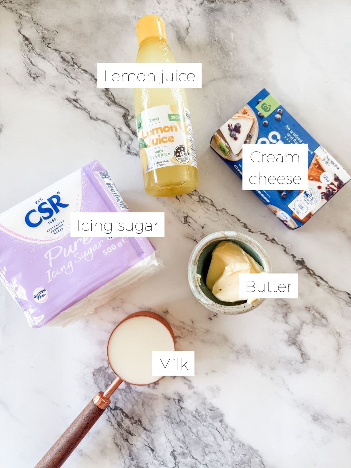 Ingredients in Icing for Pumpkin Bread With Cream Cheese Icing - icing sugar, lemon juice, butter, cream cheese. 