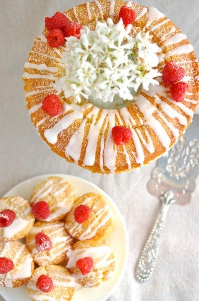 Vanilla almond cake with lemon drizzle and raspberries