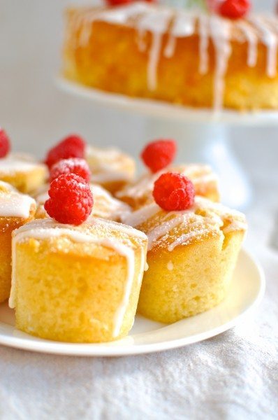 Vanilla almond cake with lemon drizzle and raspberries