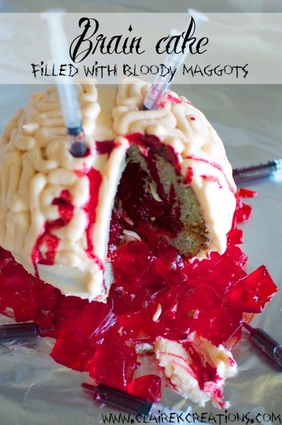 Brain piñata cake filled with bloody maggots via www.clairekcreations.com