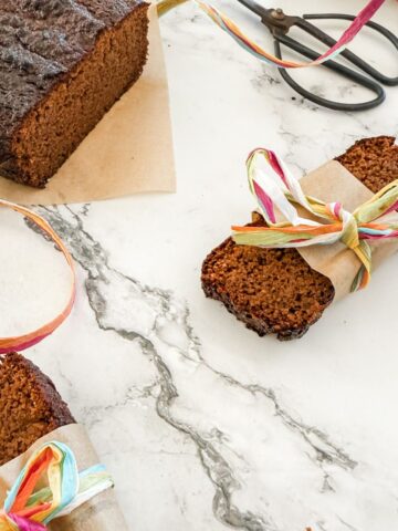 Gluten-Free Gingerbread Loaf Cake - sliced & with ribbons.