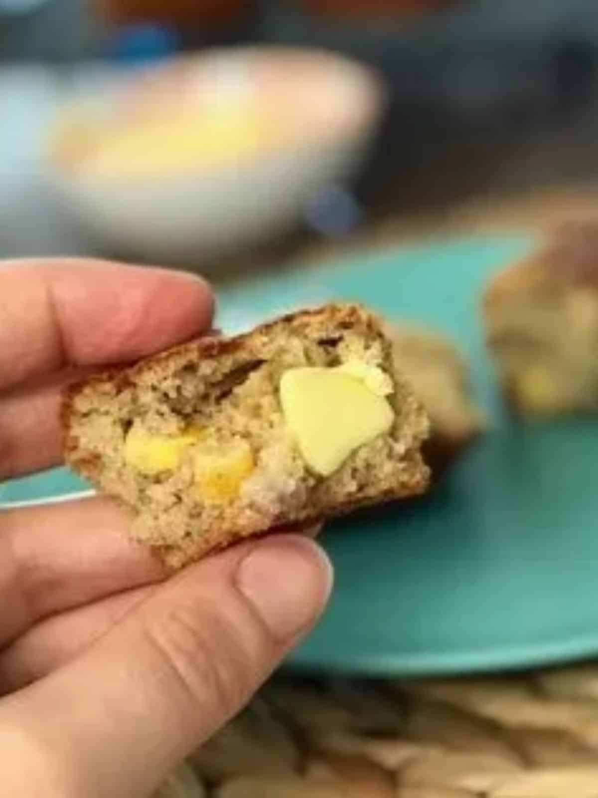 Cheese and corn muffins with ham spread with butter