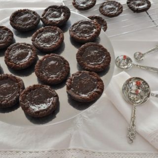 Salted caramel chocolate tarts - death by chocolate sweet adventures blog hop
