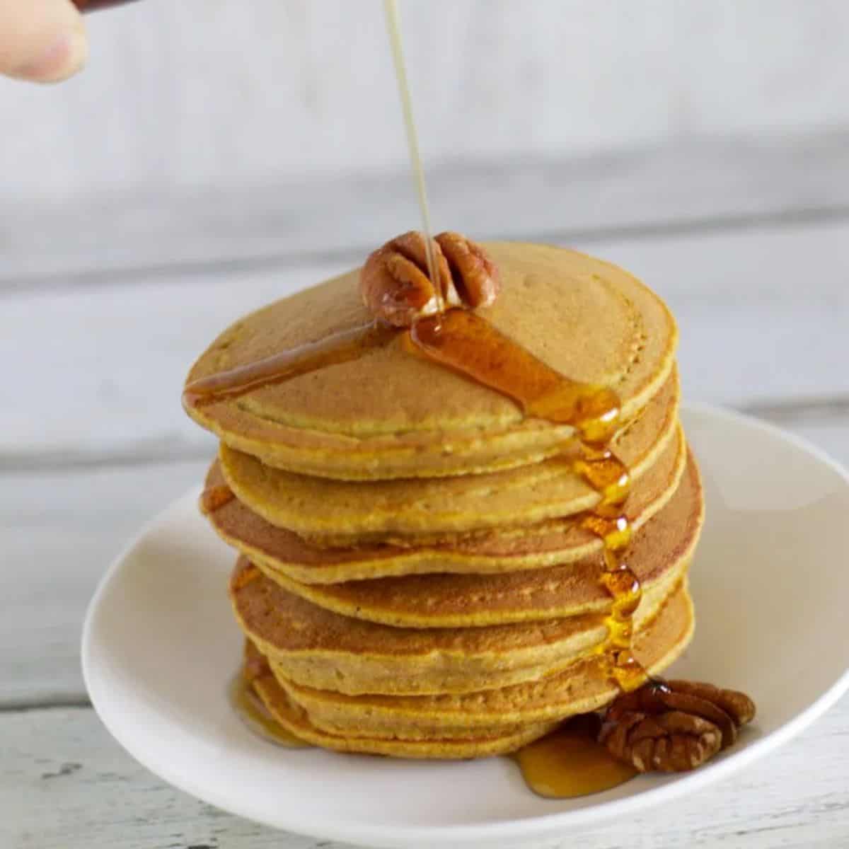 Maple pumpkin pancakes with maple syrup