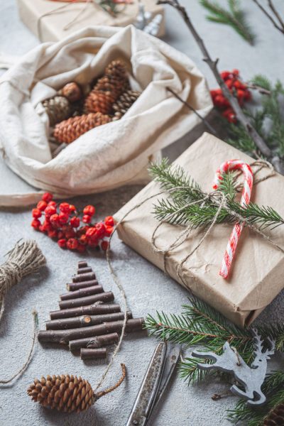 Candy cane decoration on brown paper Christmas present