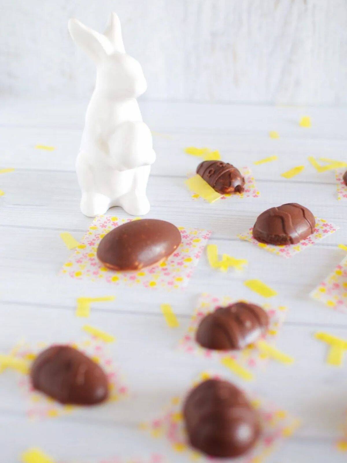 Healthy chocolate Easter eggs on a white backdrop
