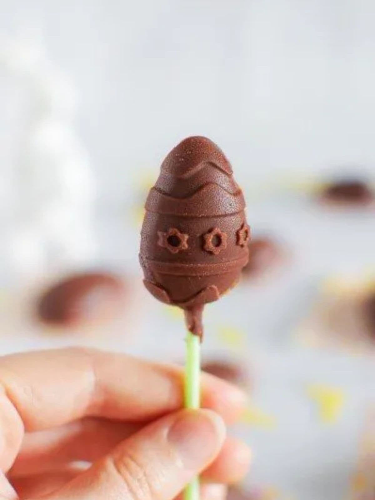 Healthy chocolate easter egg on a stick