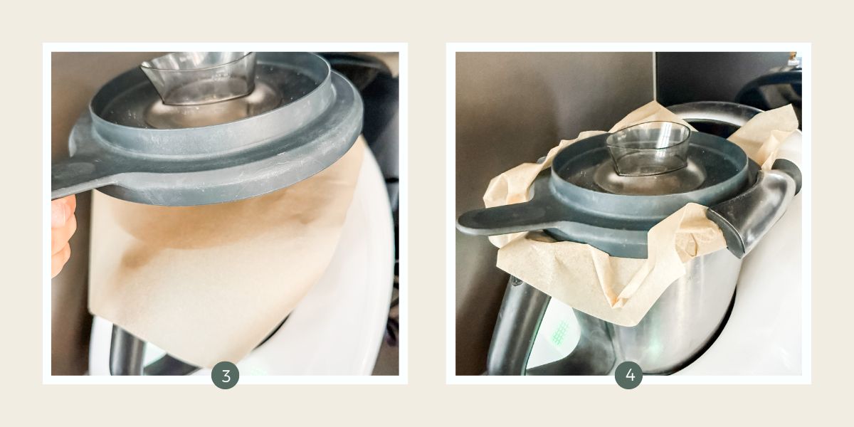 Thermomix bowl with sheet of baking paper over the top to prevent powder from spreading. 