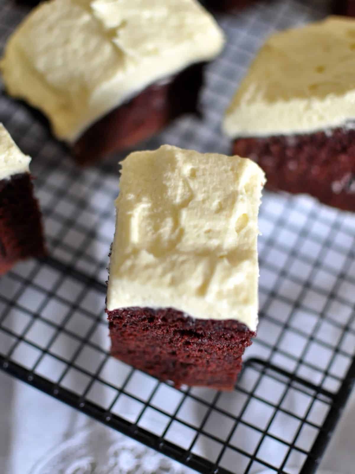 Best red velvet cake with buttercream icing (frosting) on wire rack