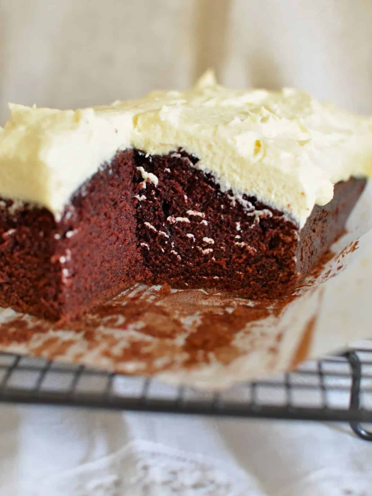 Best red velvet cake with buttercream icing (frosting) square cut out