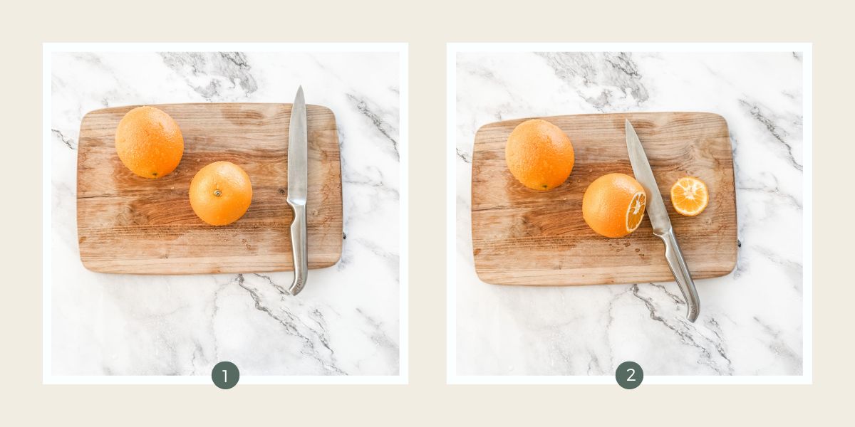 2 oranges on a chopping board with a sharp knife for making dried oranges for Christmas. 
