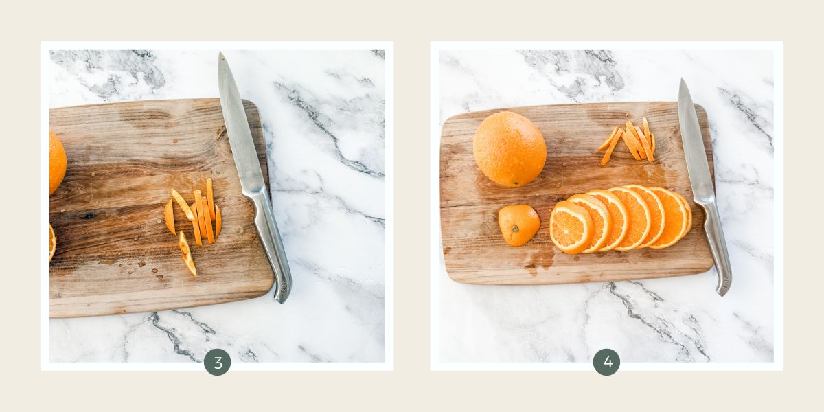 Oranges on a wood chopping board with sharp knife slicing into rounds. 