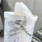 homemade baby wipes in a plastic marble pattern container