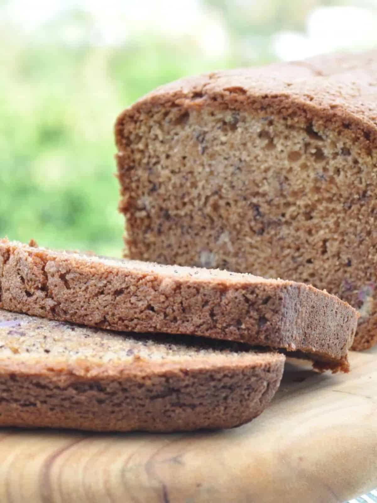 Banana bread by the beach The best ever banana bread sliced on a chopping board