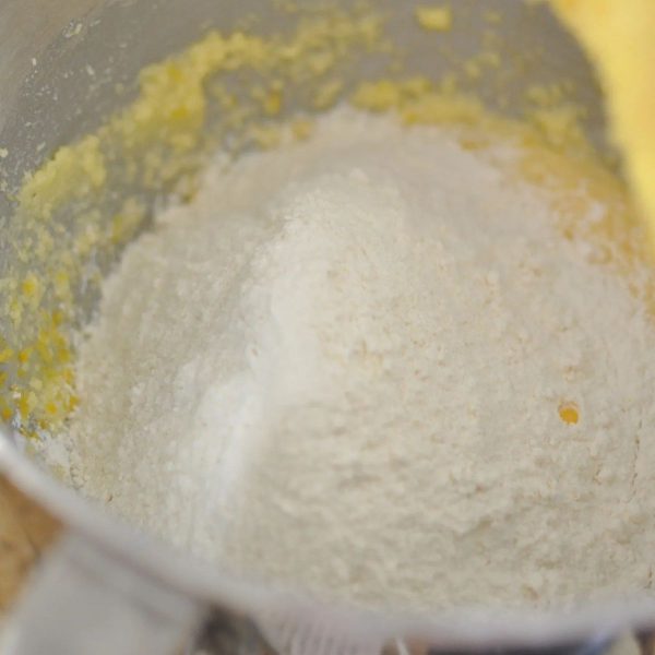 Flour being mixed into Madeira cake batter