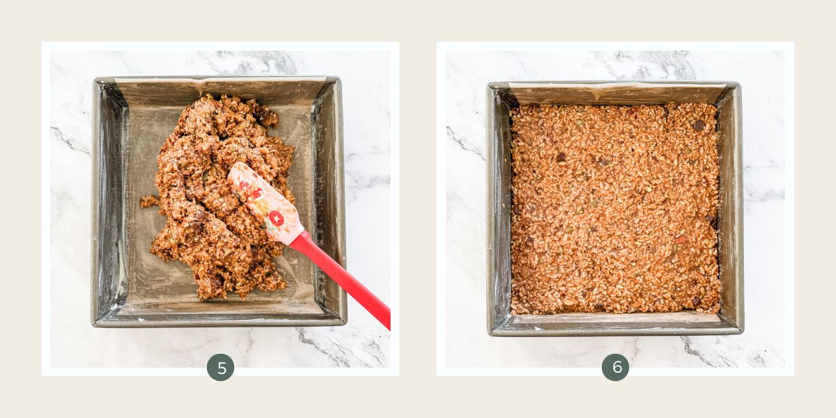 Muesli bar batter being spread into a square tin lined with baking paper.