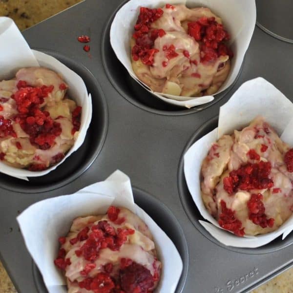 Healthy raspberry and white chocolate muffins ready for the oven