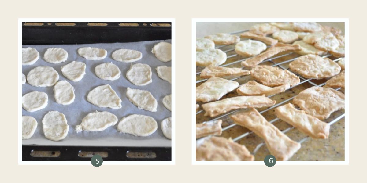 Homemade water cracker dough in shapes on a baking tray lined with baking paper and baked and cooling on a rack.