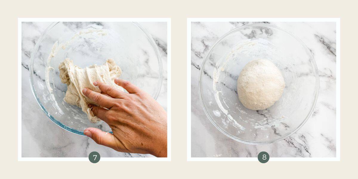 Folding ciabatta bread dough with a hand in a glass bowl & ball of dough in glass bowl on marble bench top. 