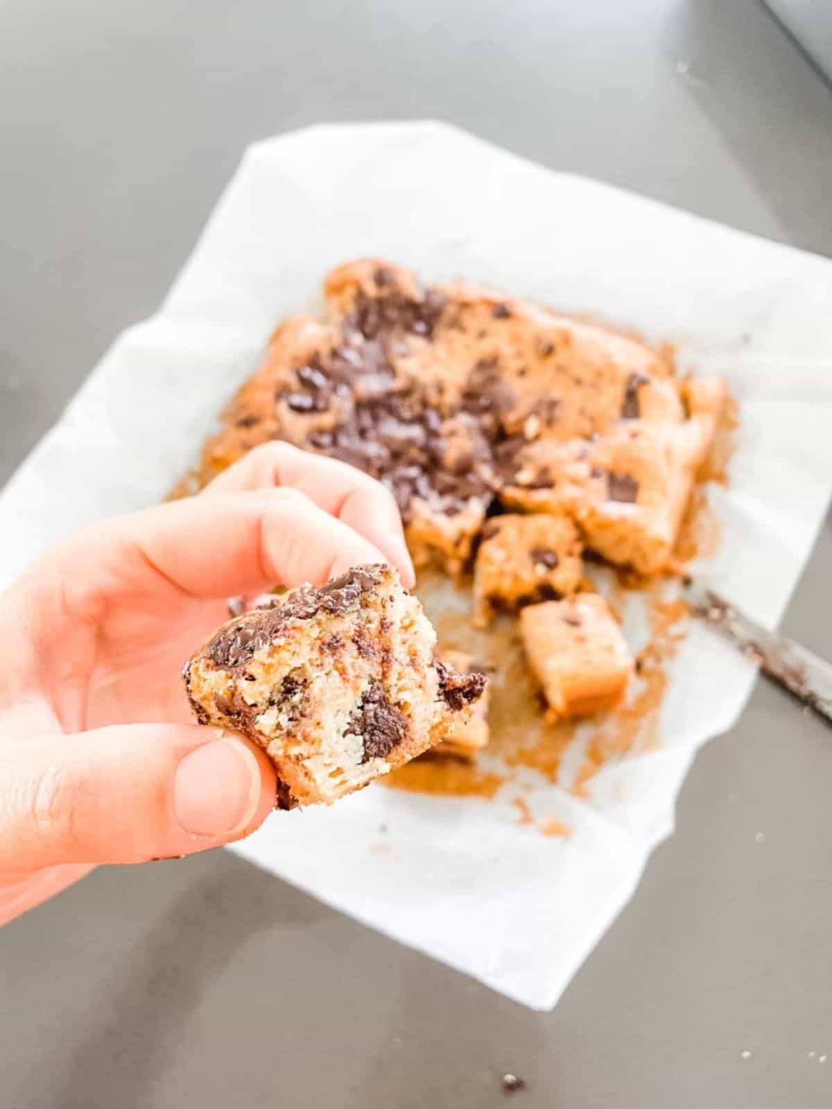 Gluten free blondies with chocolate chunks sliced ready to eat.