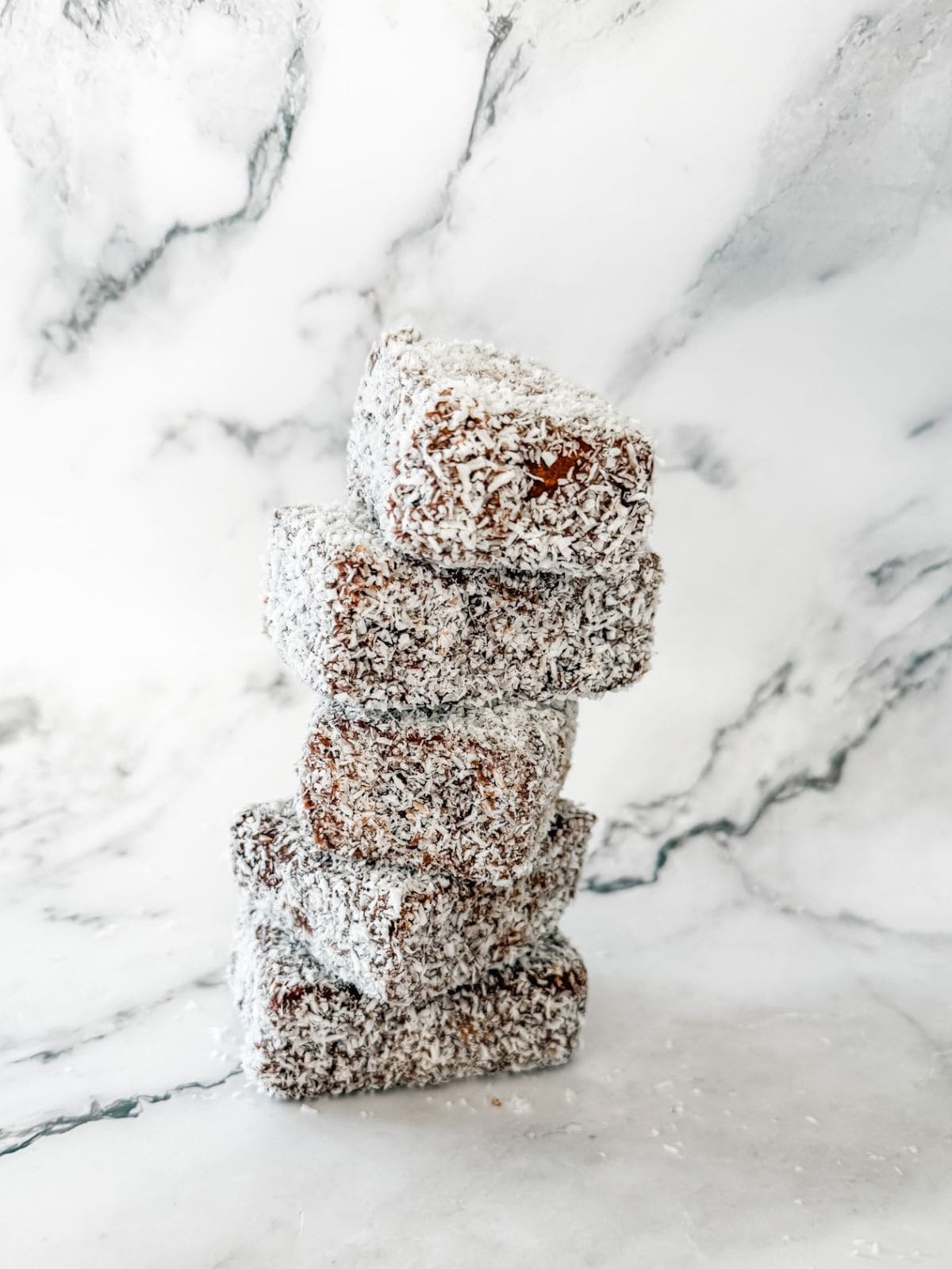 Homemade lamingtons in the Thermomix - stack of 5 lamingtons