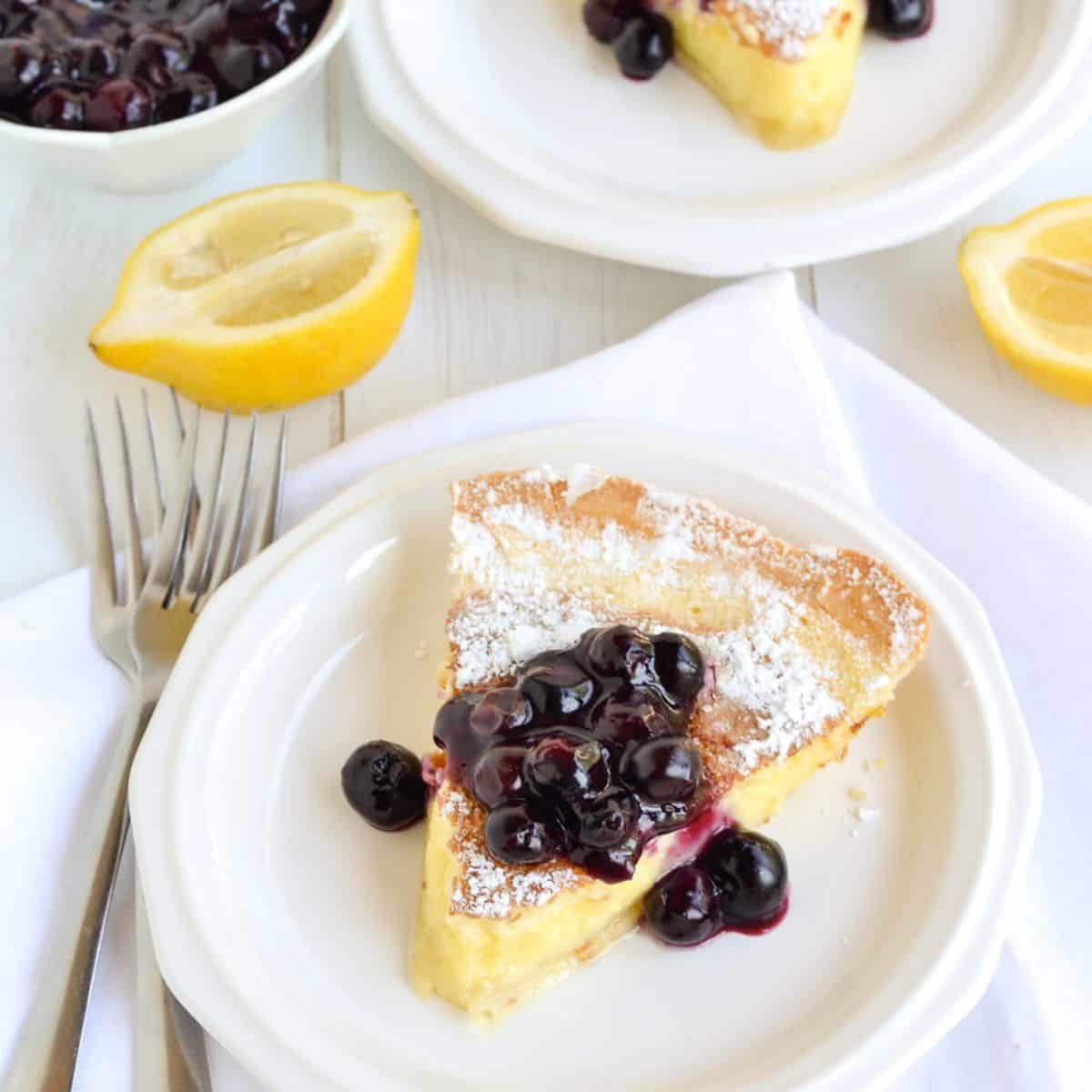 Lemon pie cake with blueberry compote