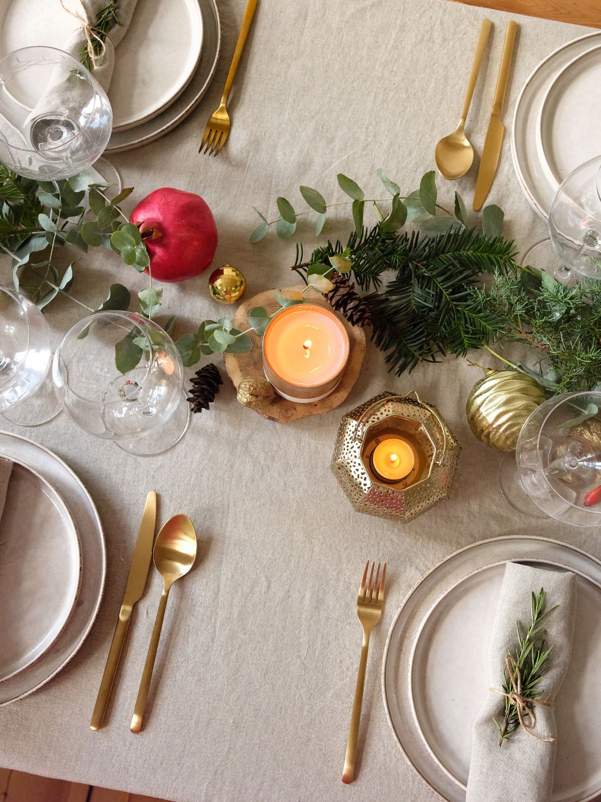 Christmas table set with gold cutlery for a simple Christmas lunch.